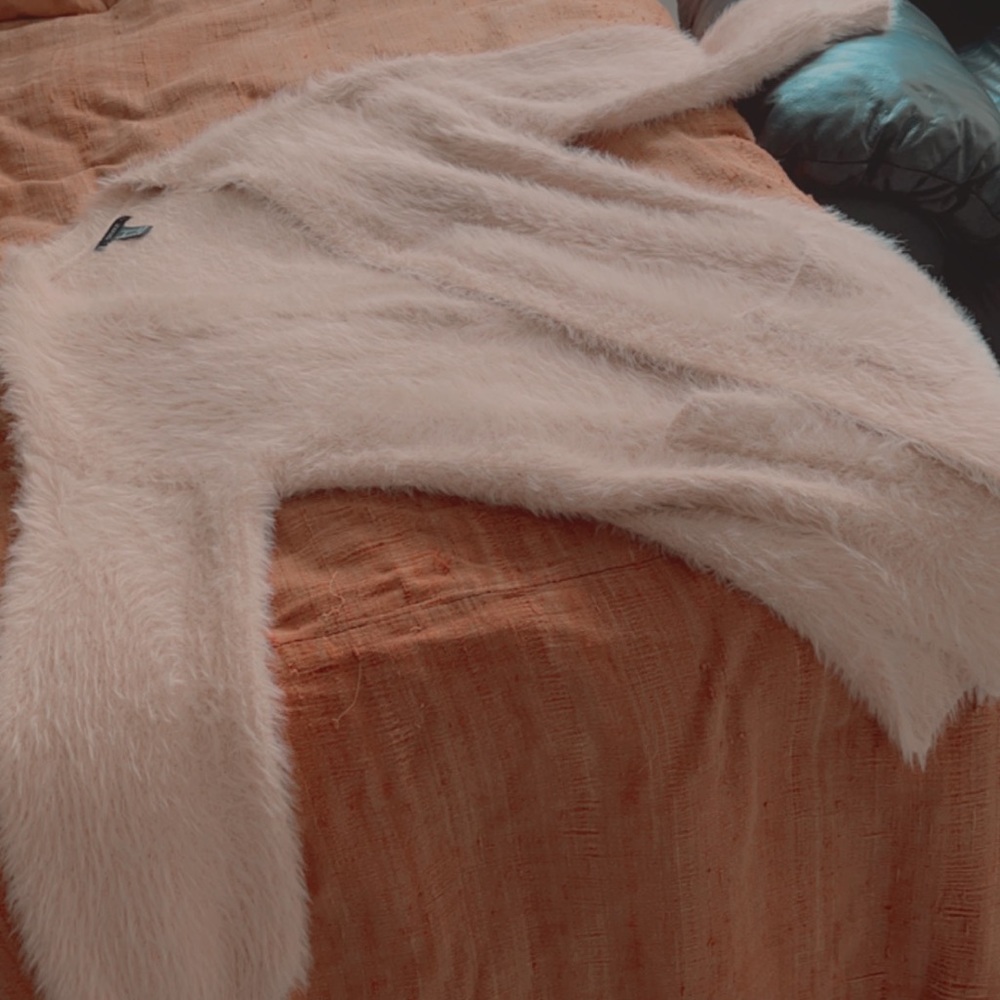 pink fuzzy cardigan